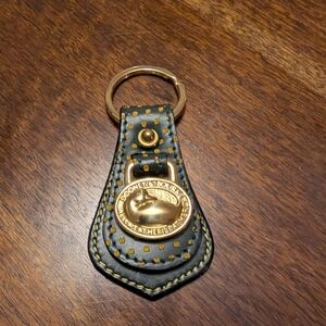 Dooney & Bourke Dark Green and Gold Key Holder